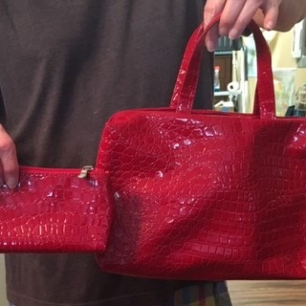 Red purse with makeup bag